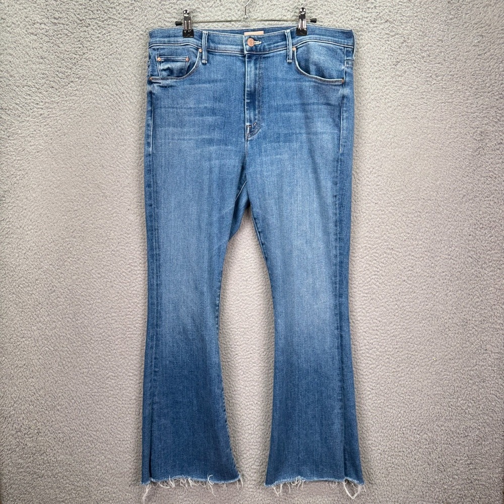 MOTHER The Weekender Light Blue Denim Flare Jeans